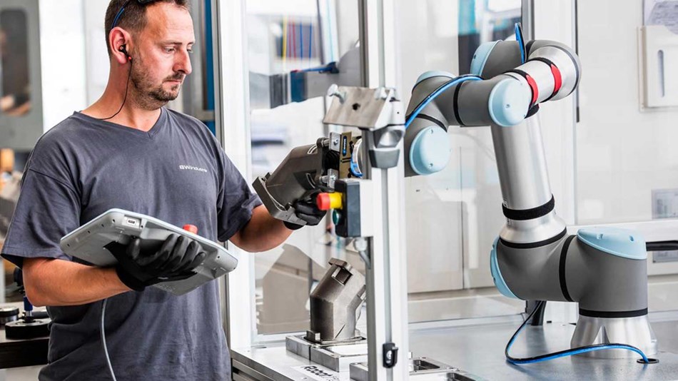 Man with UR16e collaborative robot