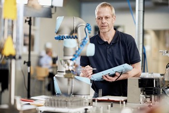 Man with collaborative robot