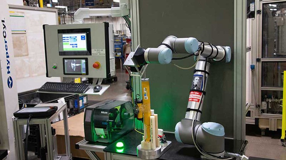 A UR10 cobot performs inspection duties