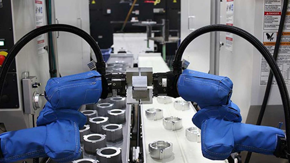 two UR5 robots work in tandem in a vision controlled machine tending application.